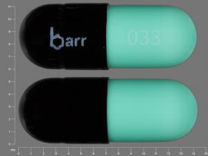 Pill barr 033 Black & Green Capsule-shape is Chlordiazepoxide Hydrochloride