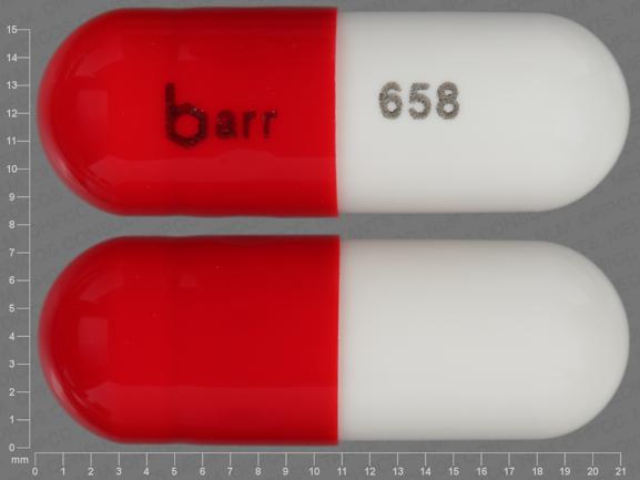 Pill barr 658 Red & White Capsule-shape is Acetaminophen and Oxycodone Hydrochloride