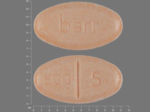 Pill barr 833 5 Orange Elliptical/Oval is Warfarin Sodium