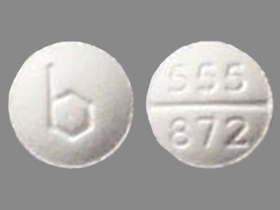 Pill b 555 872 White Round is Medroxyprogesterone Acetate.