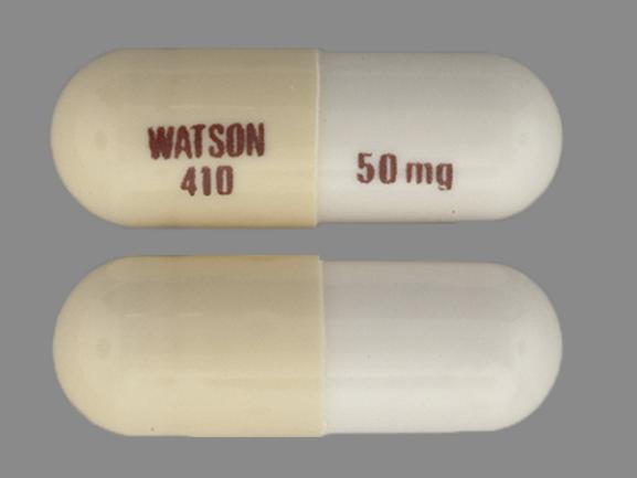 Pill WATSON 410 50 mg Beige Capsule/Oblong is Doxycycline Monohydrate