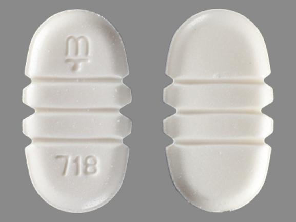 Pill Logo 718 White Elliptical/Oval is Buspirone Hydrochloride
