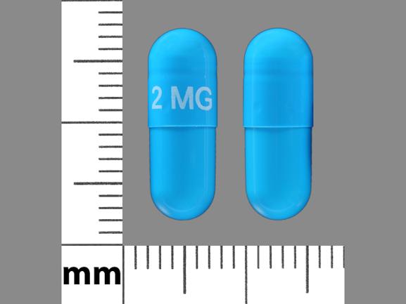 Pill 2 MG Blue Capsule/Oblong is Tizanidine Hydrochloride