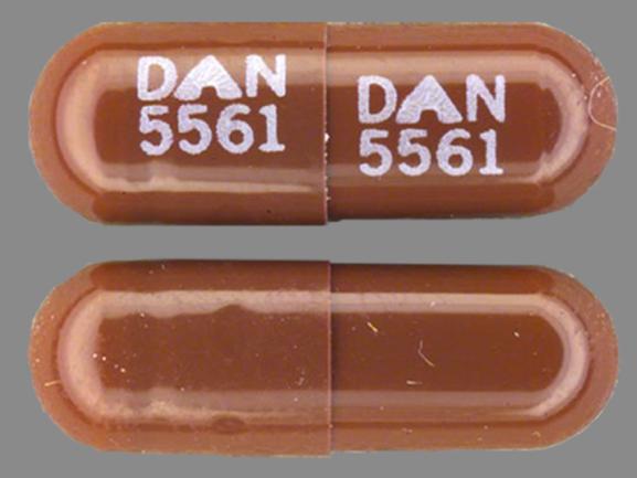 Pill DAN 5561 DAN 5561 Brown Capsule/Oblong is Disopyramide Phosphate