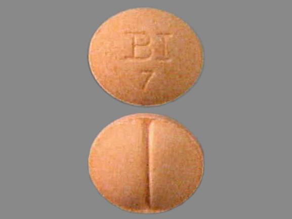 128 R Pill Orange Round 7mm - Pill Identifier