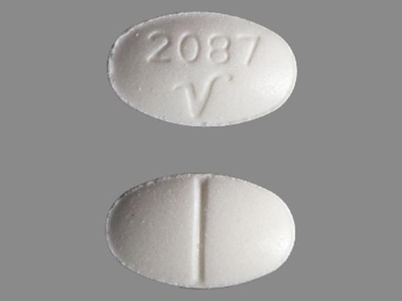 Pill 2087 V White Elliptical/Oval is Alprazolam.