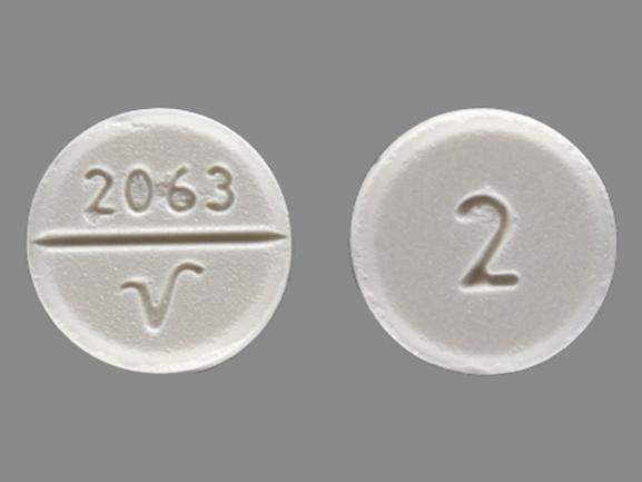 Pill 2 2063 V White Round is Acetaminophen and Codeine Phosphate