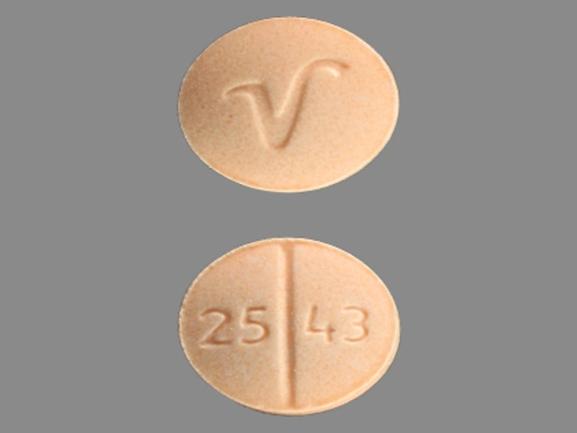 Pill V 25 43 Peach Oval is Clonidine Hydrochloride