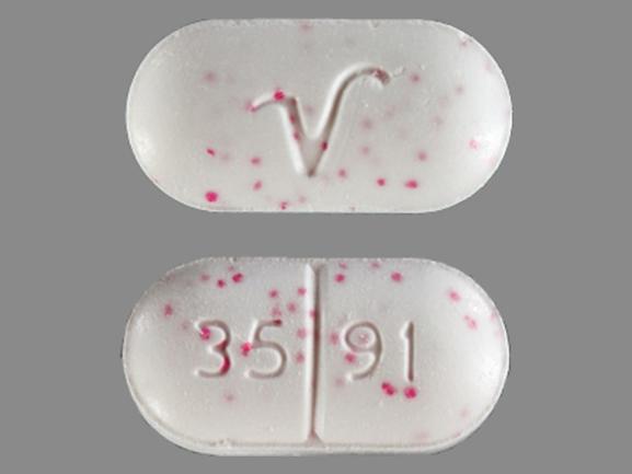 Pill 35 91 V White & Red Specks Capsule/Oblong is Acetaminophen and Hydrocodone Bitartrate