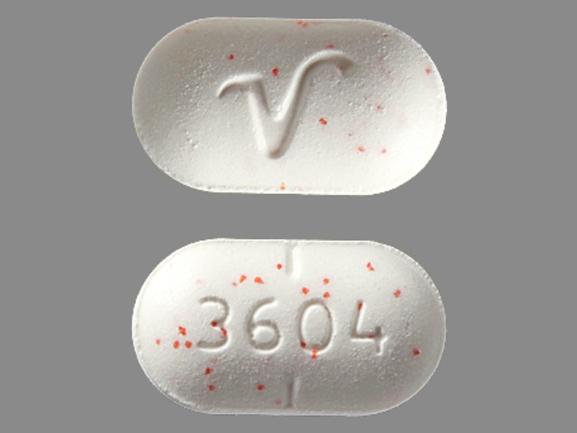 Pill 3604 V White Capsule/Oblong is Acetaminophen and Hydrocodone Bitartrate