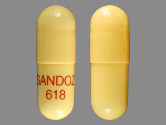 Pill SANDOZ 618 Yellow Capsule/Oblong is Rivastigmine Tartrate