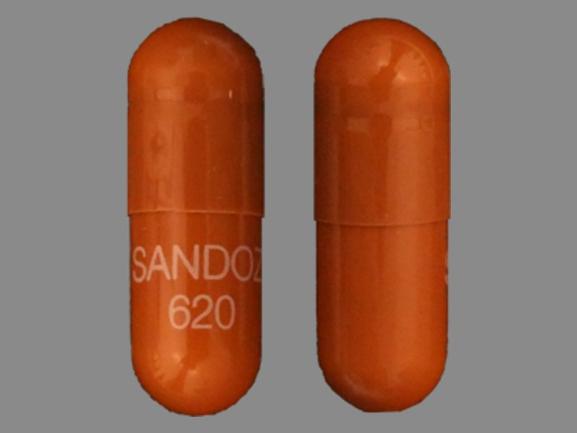 Pill SANDOZ 620 Red Capsule/Oblong is Rivastigmine Tartrate