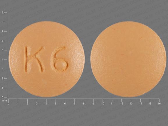 Pill K 6 Orange Round is Cyclobenzaprine Hydrochloride