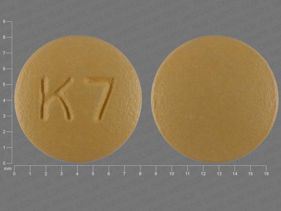 Pill K 7 Yellow Round is Cyclobenzaprine Hydrochloride
