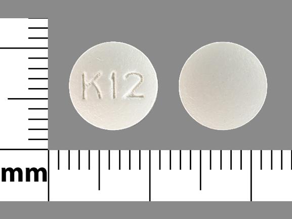 Pill K 12 White Round is Hydroxyzine Hydrochloride