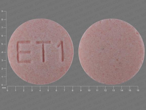 Pill ET1 Pink Round is Meclizine Hydrochloride (Chewable)