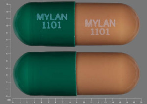 Pill MYLAN 1101 MYLAN 1101 Green & Orange Capsule/Oblong is Prazosin Hydrochloride
