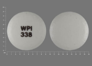 Pill WPI 338 White Round is Diclofenac Sodium Delayed Release