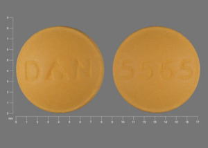 Pill 5565 DAN Yellow Round is Hydroxyzine Hydrochloride