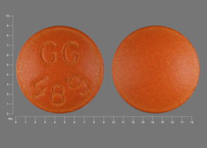 Pill GG 489 Brown Round is Fluphenazine Hydrochloride