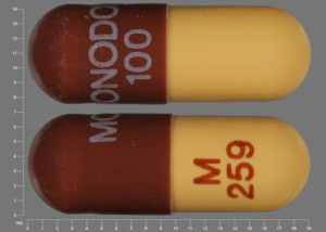 Pill MONODOX 100 M 259 Brown & Yellow Capsule/Oblong is Monodox