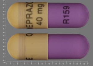 Pill OMEPRAZOLE 40mg R159 Purple Capsule-shape is Omeprazole Delayed Release