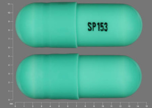 Pill SP153 Green Capsule/Oblong is Chlordiazepoxide Hydrochloride and Clidinium Bromide