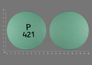 Pill P 421 is Donnatal Extentabs atropine sulfate 0.0582 mg / hyoscyamine sulfate 0.3111 mg / phenobarbital  48.6 mg / scopolamine hydrobromide 0.0195 mg