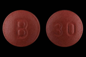 Pill 30 B Brown Round is Nifedical XL