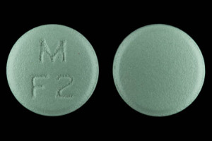 Pill M F2 Green Round is Famotidine