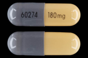 Pill 60274 180 mg Gray & Yellow Capsule-shape is Verapamil Hydrochloride SR
