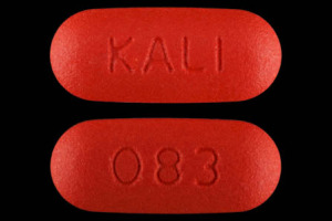 Pill 083 KALI Orange Capsule/Oblong is Acetaminophen and Tramadol Hydrochloride