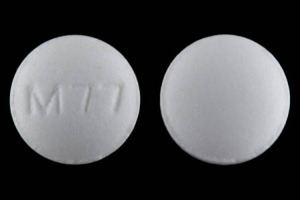 Pill M77 White Round is Amitriptyline Hydrochloride