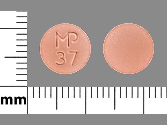 Pill MP 37 Orange Round is Doxycycline Hyclate
