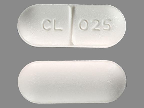 Pill CL 025 White Capsule/Oblong is Colchicine and Probenecid