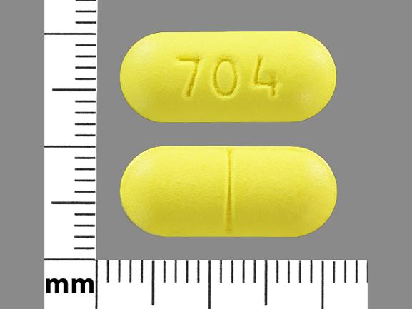 Pill 704 Yellow Capsule/Oblong is Salsalate