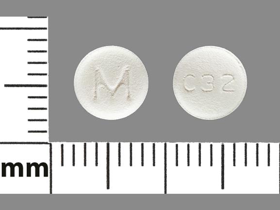 Pill M C32 White Round is Carvedilol