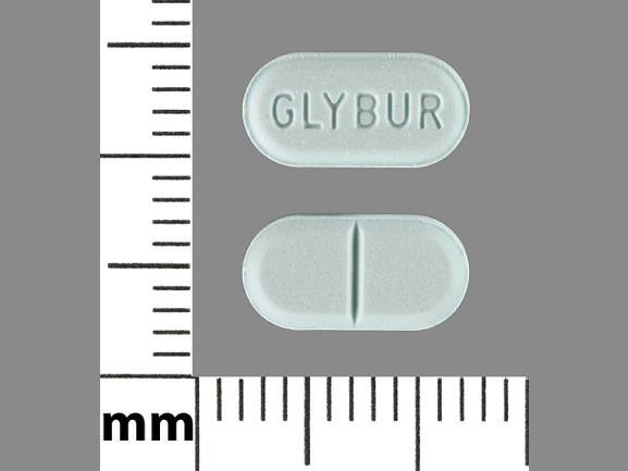 Pill GLYBUR Blue Capsule/Oblong is Glyburide