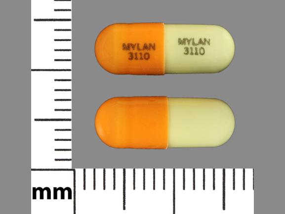 Pill MYLAN 3110 MYLAN 3110 Peach & White Capsule-shape is Temazepam