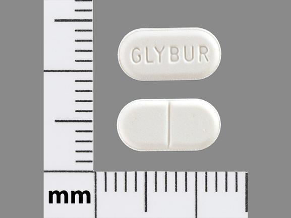 Pill GLYBUR White Capsule/Oblong is Glyburide