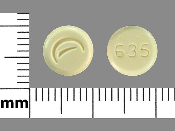 Pill Logo 635 Yellow Round is Lovastatin