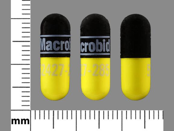 Pill Macrobid 52427-285 Black & Yellow Capsule/Oblong is Nitrofurantoin (Monohydrate/Macrocrystals)