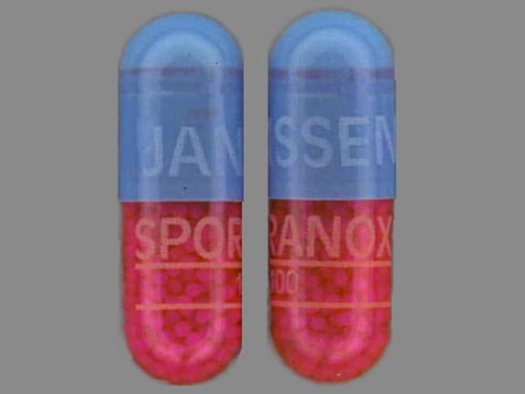 Pill JANSSEN SPORANOX 100 Gray & Pink Capsule/Oblong is Sporanox