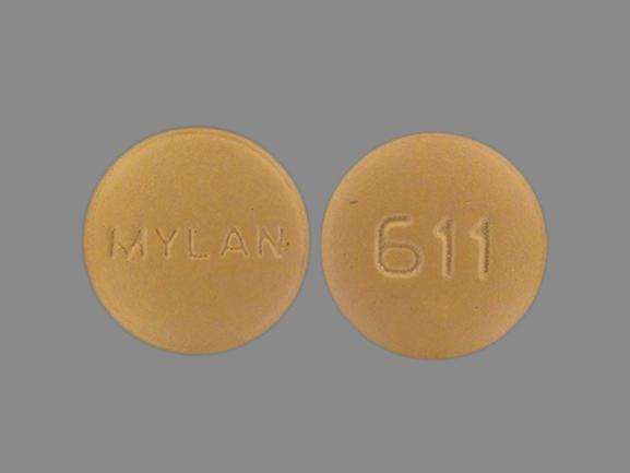 Pill 611 MYLAN Beige Round is Methyldopa