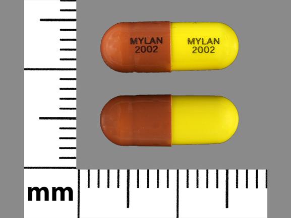 Pill MYLAN 2002 MYLAN 2002 Red & Yellow Capsule-shape is Thiothixene