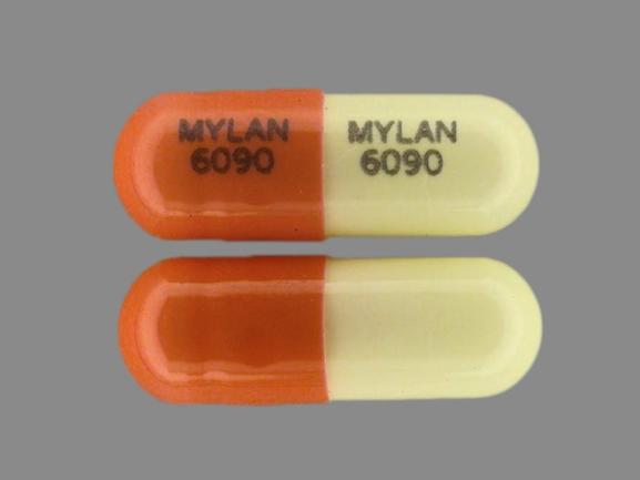 Pill MYLAN 6090 MYLAN 6090 Pink & White Capsule/Oblong is Diltiazem Hydrochloride Extended-Release (SR)