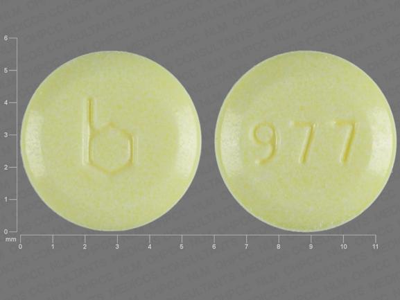 Pill b 977 Yellow Round is Loestrin Fe 1/20