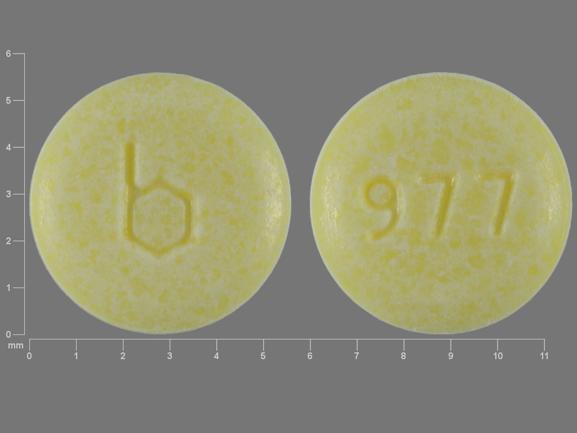 Pill b 977 Yellow Round is Junel Fe 24