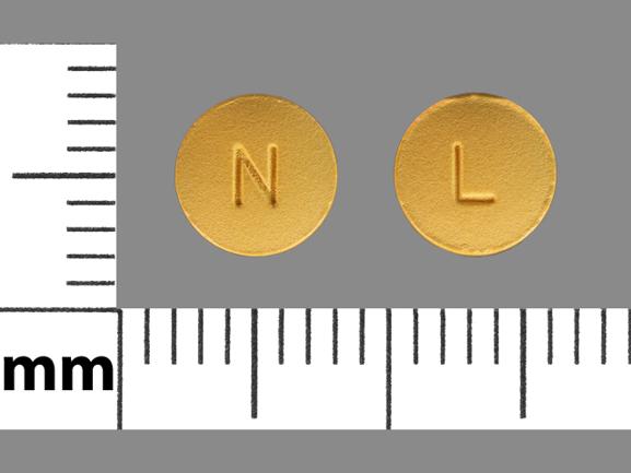 Pill N L Yellow Round is Letrozole