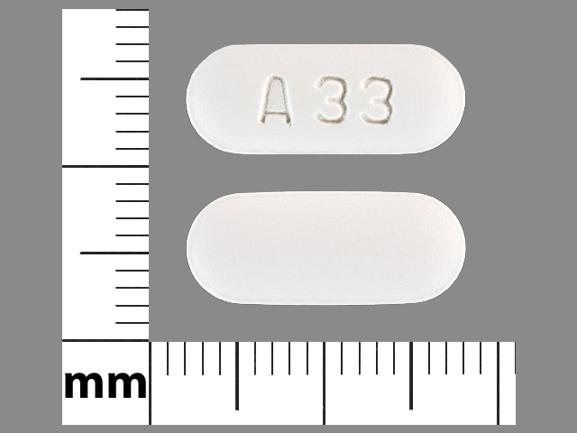 Pill A33 White Oval is Cefuroxime Axetil